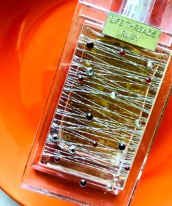 Life Threads Ruby La Prairie